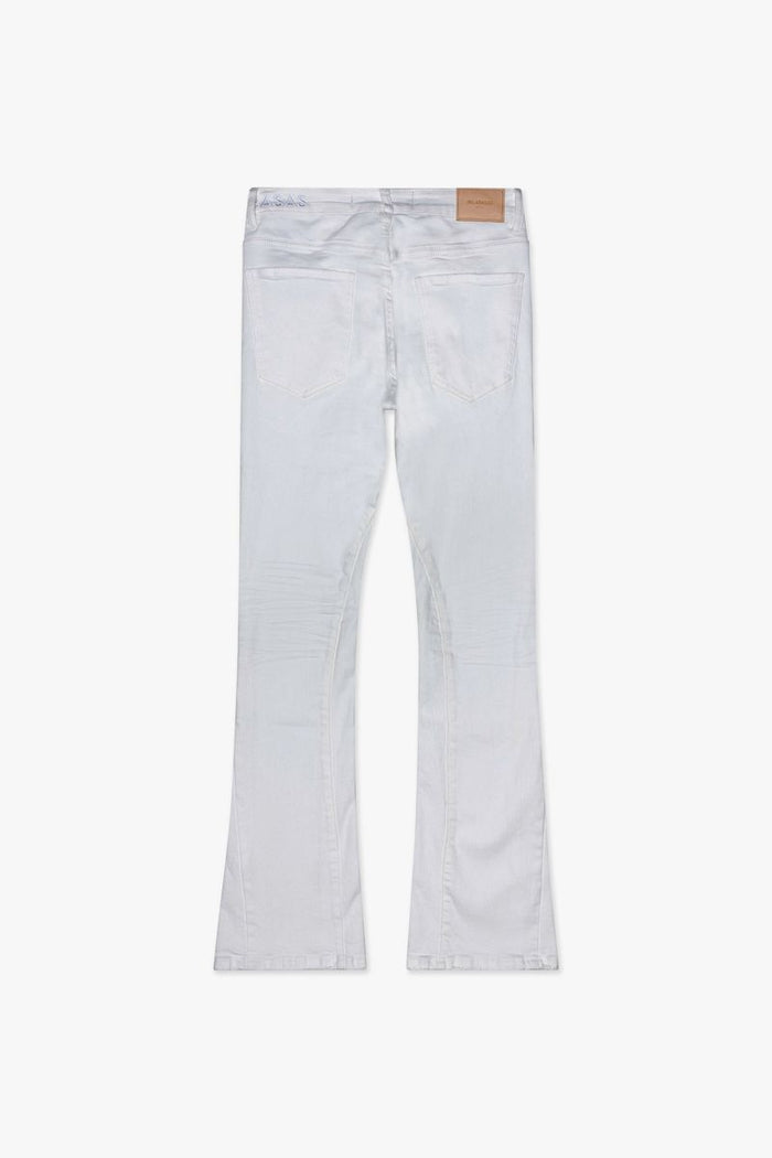 Close-up view of Valabasas Mr Stacked white denim jeans showcasing the stacked leg design and stitching details