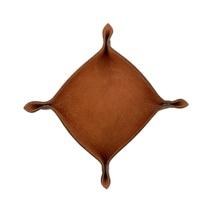 Unique Valet Tray with Sheep Skin by Hide & Drink, featuring a classic design that allows for tidy storage of personal items like wallets and coins. The durable full grain leather and sheepskin material make this catchall an excellent choice for everyday use. It is hand cut, hand sewn, and fire branded, highlighting artisan quality produced in small batches that is ideal for all home and travel essentials.