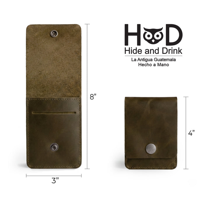 Dimensions of the green Vertical Wallet by Hide & Drink, illustrating its practicality in small pockets. This Vertical Front Pocket Wallet with Card Slot offers compact storage for bills and functions as a card holder, made from high-quality full grain leather through small batch production methods, featuring hand cut and hand sewn details and fire branding. Handmade in La Antigua Guatemala & Oaxaca Mexico.