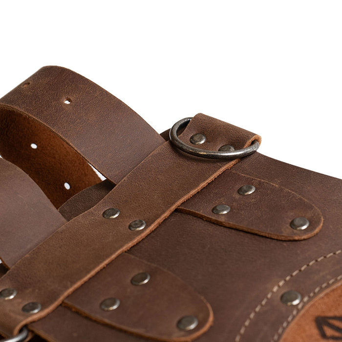 Detailed view of the Viking Belt by Hide & Play, emphasizing the adjustable straps and hand-sewn craftsmanship. This rustic accessory made from full grain leather is perfect for cosplay, costume parties, and LARPing, embodying small batch production from artisans in La Antigua Guatemala.