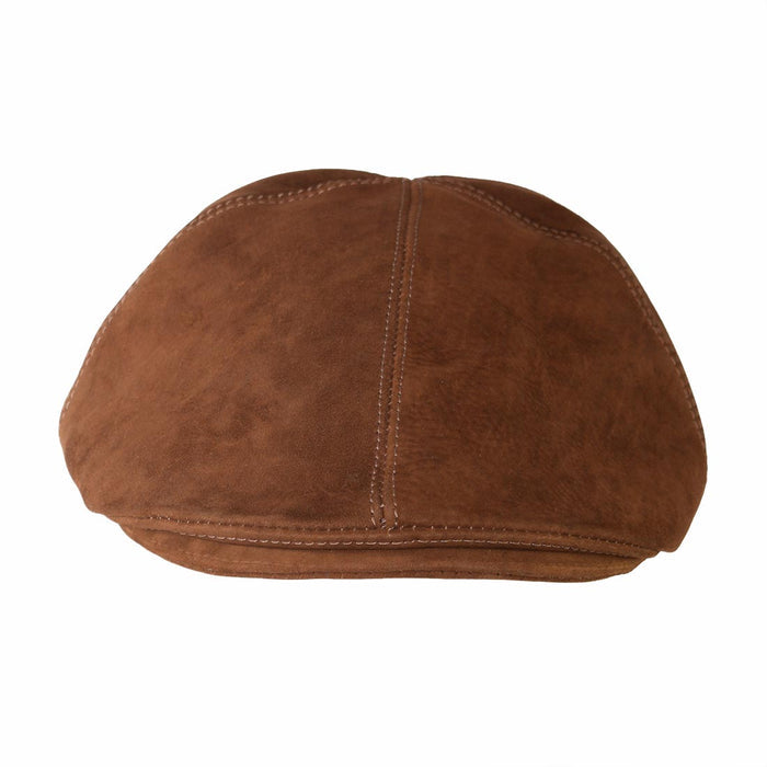 Top view of a refined men’s driver's cap from Hide & Drink, showcasing its unique suede leather texture. This vintage cap combines the elegance of full grain leather with artisan craftsmanship, handmade in La Antigua Guatemala & Oaxaca Mexico, making it a must-have for stylish men.