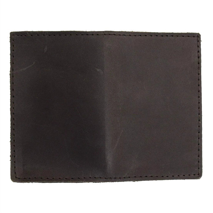 Back view of Hide & Drink's Vintage Card Holder in black leather, showcasing its sturdy construction. A practical wallet and cash organizer, this pocket accessory is made from full grain leather and crafted in small batches in La Antigua Guatemala & Oaxaca Mexico.