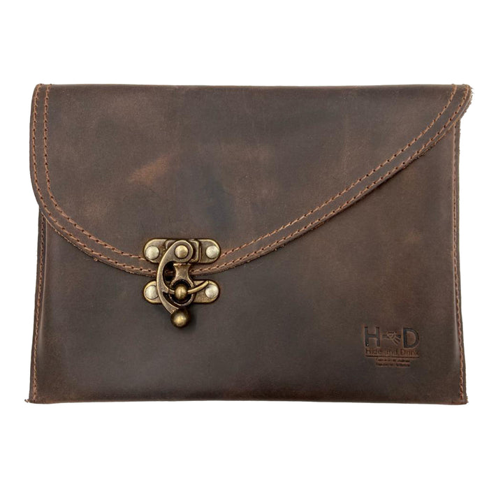 Vintage Clutch Bag from Hide & Drink made of Full Grain Leather with a unique vintage clasp, showcasing artisan craftsmanship in small batch production. Handmade in La Antigua Guatemala, featuring fire branded details.
