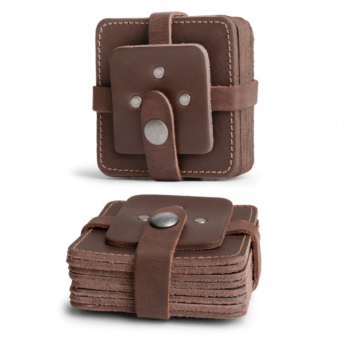Vintage Squared Coaster (8 pack) by Hide & Drink presented in a stylish case. This coasters set of 8 serves as a table protection for drinks and an elegant accessory for any bar or office. Crafted from premium full grain leather with small batch production techniques, this handmade item combines artfulness with functionality, fire branded, and skillfully handcrafted in La Antigua Guatemala & Oaxaca Mexico.