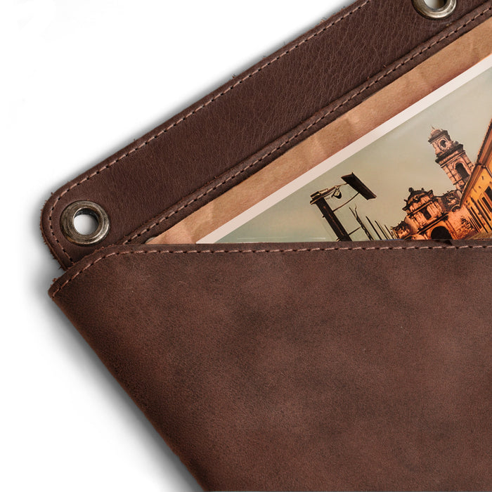 Close-up of the Wall File Organizer by Leather At Home, illustrating the detailed stitching and full grain leather texture. This Leather Wall Organizer for Office is an excellent Hanging Wall File Holder, perfect for organizing important documents and mail in style. Artisan crafted in La Antigua Guatemala & Oaxaca Mexico.