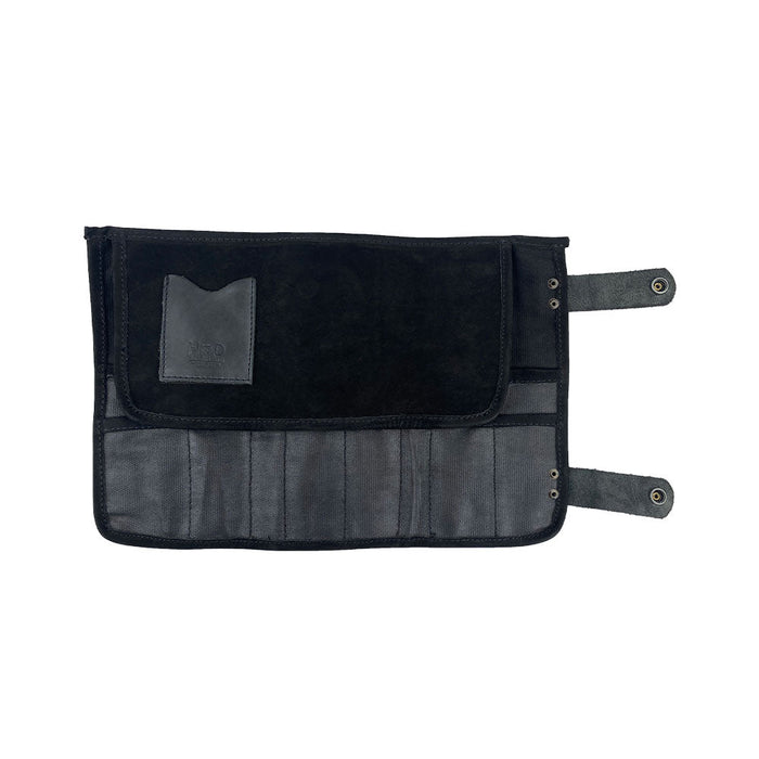 Hide & Drink's Barber Tool Roll displays a Snap Tool Roll Up Bag with 14 Slots designed specifically for scissors & screwdrivers. Made from durable Full Grain Leather, this portable carry case highlights StockyardX's small batch production, artisan craftsmanship, hand cut, hand sewn, and fire branded in La Antigua Guatemala & Oaxaca Mexico.