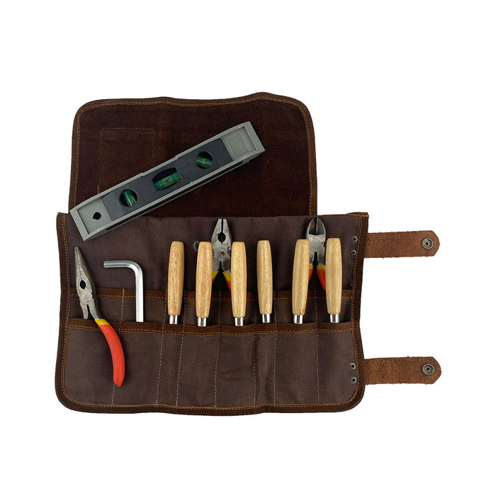 Hide & Drink's Barber Tool Roll features a Snap Tool Roll Up Bag with 14 Slots, designed for effective storage of scissors & screwdrivers. Made from durable Full Grain Leather, this portable carry case reflects StockyardX's small batch production ethos and artisan craftsmanship, hand cut, hand sewn, and fire branded in La Antigua Guatemala & Oaxaca Mexico.