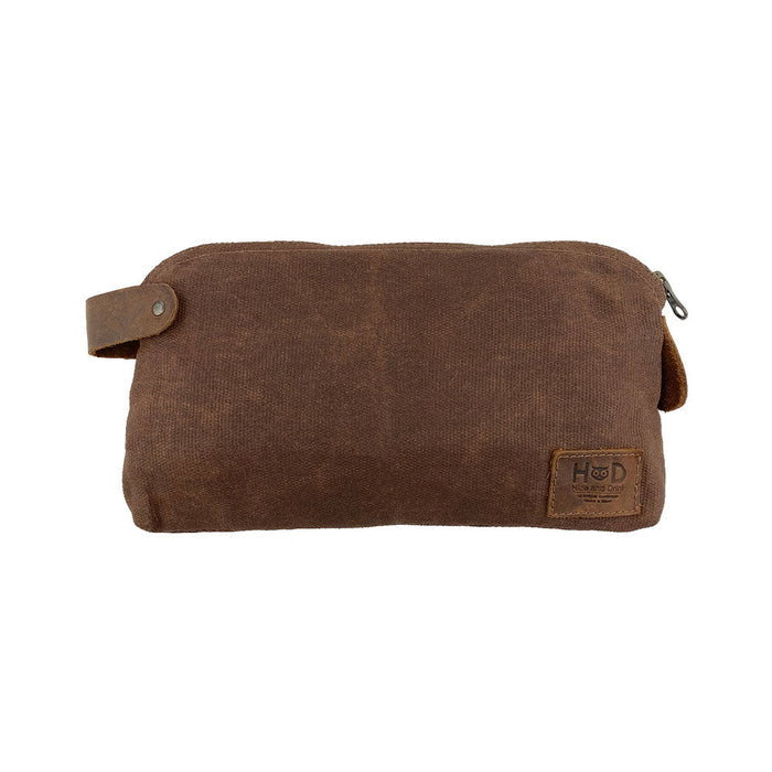 Dopp Kit Utility Bag by Hide & Drink showcasing a visually captivating design with multi-purpose functionality. This artisan Dopp Kit Utility Bag is perfect for cords and chargers, crafted from high-quality full grain leather with emphasis on hand cut and hand sewn craftsmanship, handmade in La Antigua Guatemala & Oaxaca Mexico.