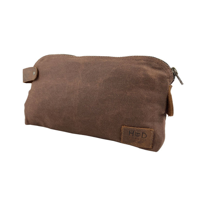 Dopp Kit Utility Bag by Hide & Drink highlighting its quality craftsmanship and classic appeal. This artisan Dopp Kit Utility Bag for cords & chargers is made from full grain leather with emphasis on hand cut and hand sewn styles, handmade in La Antigua Guatemala & Oaxaca Mexico.