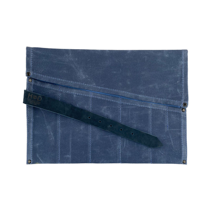 An elegant Large Tool Roll from Hide & Drink, perfect for tool organization. This Portable Carry-On Pouch features 6 slots designed for woodworking tools. Crafted from high-quality waxed canvas and full grain leather variations, this artisan piece represents small batch production, hand cut and hand sewn in La Antigua Guatemala & Oaxaca Mexico.