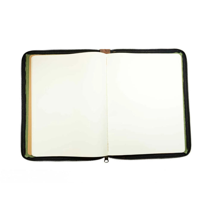 Blank pages inside the Waxed Canvas Zippered Journal Cover for Moleskine (Notebook NOT Included) by Hide & Drink, designed for easy writing and sketching. A premium Cahier Case made from Full Grain Leather, combining rustic charm with artisan craftsmanship from La Antigua Guatemala & Oaxaca Mexico.