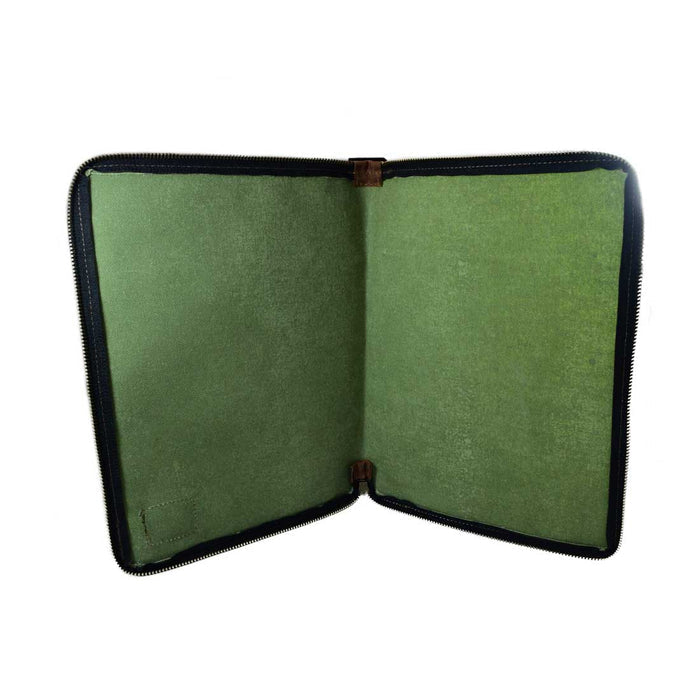 Inside view of the Waxed Canvas Zippered Journal Cover for Moleskine (Notebook NOT Included) by Hide & Drink with a green Canvas lining, showcasing its practicality as a Cahier Case. Handmade using Full Grain Leather, crafted with care in La Antigua Guatemala & Oaxaca Mexico.