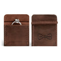 Stylish Wedding Ring Case by Hide & Groom, crafted from Full Grain Leather, showcasing small batch production and artisan craftsmanship. This handmade piece features a durable design, hand cut and hand sewn, fire branded for added elegance. Perfect for keeping your wedding ring safe.