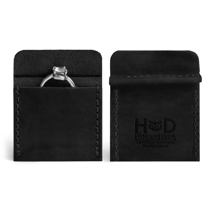 Hide & Drink Wedding Ring Case presenting an engagement ring, highlighting craftsmanship in full grain leather. This pouch organizer for travel and jewelry is designed to be a small batch production item, handmade in La Antigua Guatemala & Oaxaca Mexico.