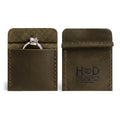 Hide & Drink Wedding Ring Case in a stylish blue hue, displaying an engagement ring. Perfect for travel, this pouch organizer for jewelry is a small batch production, handcrafted in La Antigua Guatemala & Oaxaca Mexico.