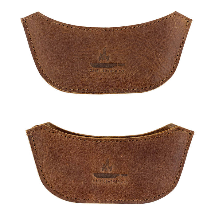 Stylish set of 2 leather handle covers for wok from Cast Leather Co., perfect for enhancing your cooking experience with the Wok Sidekick. This rustic sidekick cooking accessory is made from durable full grain leather, hand sewn and fire branded, demonstrating the artisan quality of small batch production.