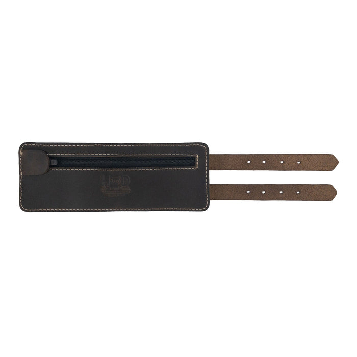 A close-up reveals Hide & Drink's Wrist-Wallet-Cuff made from premium Full Grain Leather. This rustic leather bracelet skillfully includes a hidden pouch for bills and an inner zippered pouch, balancing style and functionality. Handmade in La Antigua Guatemala & Oaxaca Mexico, it showcases dedication to craftsmanship.
