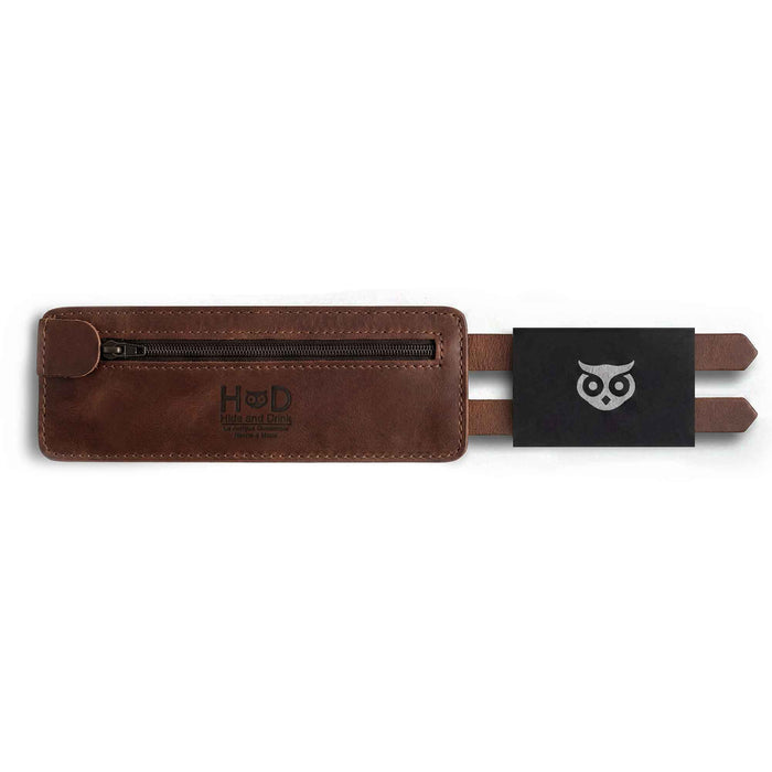 Showcasing the versatility of Hide & Drink's Wrist-Wallet-Cuff made from Full Grain Leather, this rustic leather bracelet integrates a hidden pouch for bills and an inner zippered pouch. Each handcrafted piece represents artisan quality, produced in small batches in La Antigua Guatemala & Oaxaca Mexico.