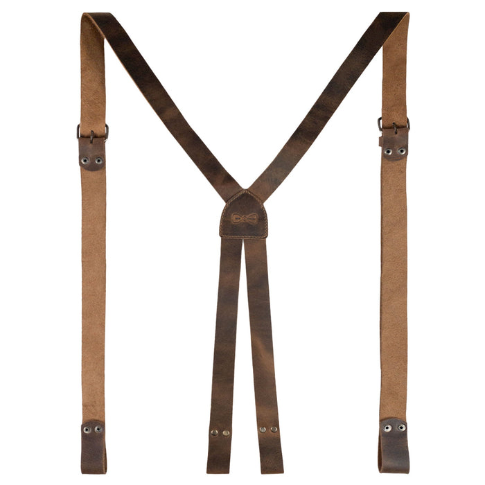 A close-up of Hide & Groom's X Back Formal Suspenders with Belt Loops in a sophisticated design. Crafted for groomsmen and formal events, these suspenders are made from full grain leather and exemplify handmade quality from La Antigua Guatemala.
