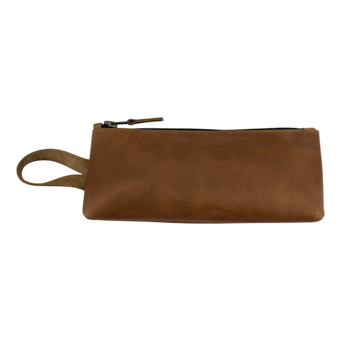 Hide & Drink's X Stitched Case, designed in a rich brown leather, is perfect for travel essentials and organizing your writing tools. This small batch production item showcases the artistry of artisans in La Antigua Guatemala and Oaxaca, Mexico.