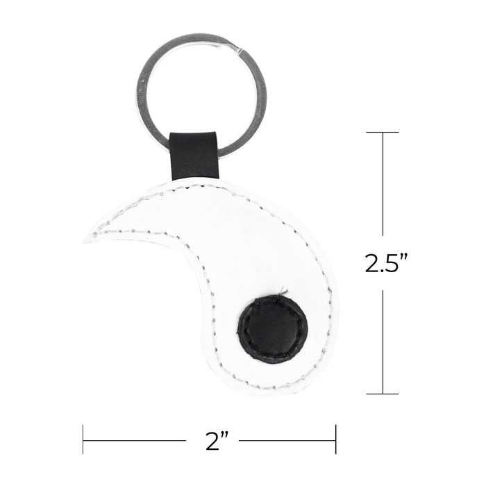 Single Yin Yang Keychain (2 pieces) by Hide & Drink, displayed with key rings that reflect the philosophy of balance and connection. Made from soft, full grain leather, these keychains honor Chinese culture and the bond of friendship. Each keychain is crafted through artisan practices with small batch production, ensuring they are hand cut, hand sewn, and fire branded for a unique touch, all handmade in La Antigua Guatemala & Oaxaca Mexico.
