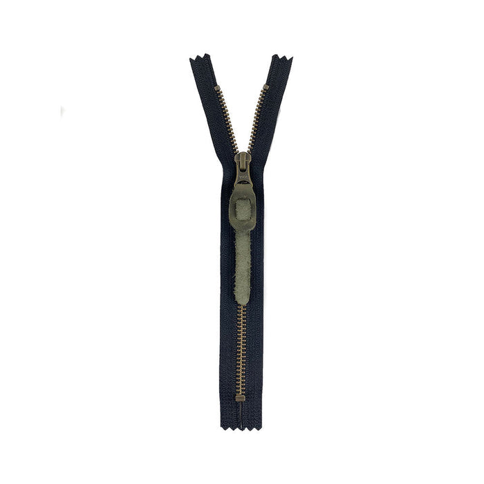 Stylish Rustic Zipper Pull Replacement by Hide & Drink, showcasing premium full grain leather. Included in a 6 pack, this pull is perfect for personalizing backpacks, jackets, wallets, luggage, and bags. Each piece is hand cut and fire branded, emphasizing artisan craftsmanship from La Antigua Guatemala & Oaxaca Mexico.