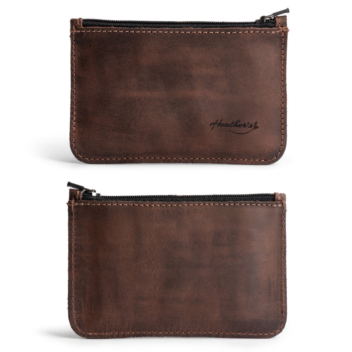 Heather's Zippered Half Wallet in rich brown full grain leather, an artisan handmade product from La Antigua Guatemala. This zippered wallet is perfect for organizing up to 6 cards plus folded bills and coins. Ideal for travel or everyday use, featuring fire branded detailing. A small batch production piece that showcases quality craftsmanship.