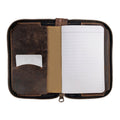 Interior view of Hide & Drink's Zippered Journal Cover for Moleskine (Notebook NOT Included), featuring a compartment for cards and a lined pad. Made from full grain leather, highlighting artisan workmanship from La Antigua Guatemala.